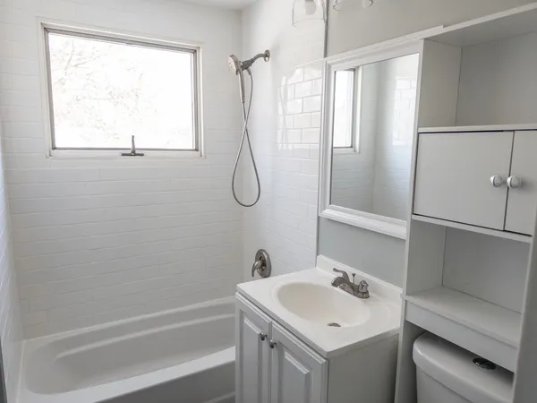 a bathroom with a sink a vanity and a mirror