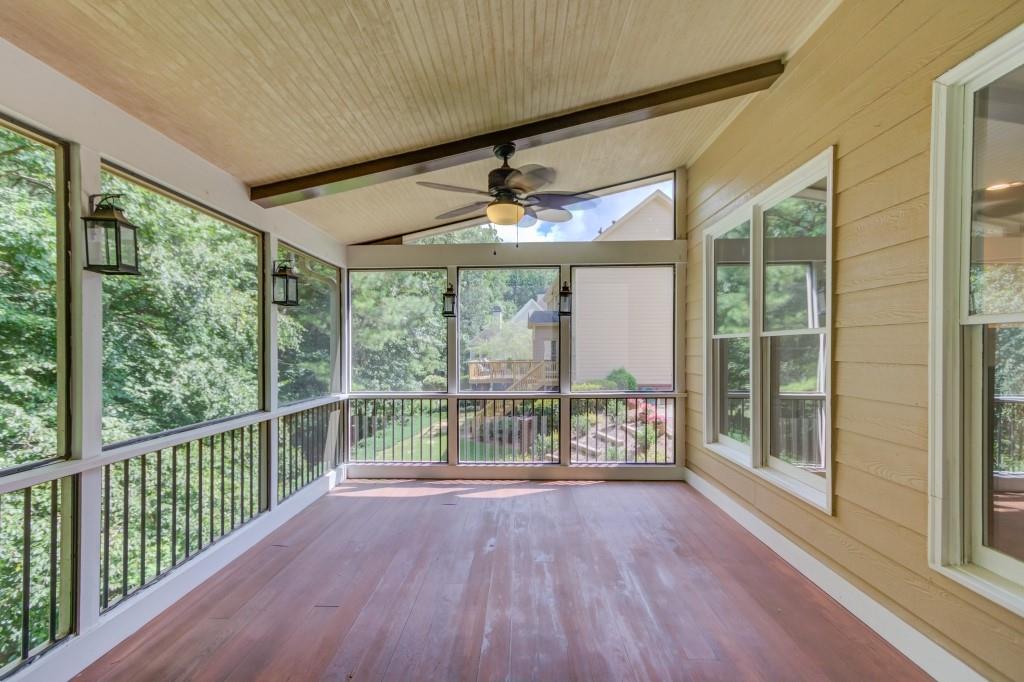 2405 Millwater Crossing Northeast Dacula, GA 30019 - Photo 20 of 63 a view of porch with a floor to ceiling window