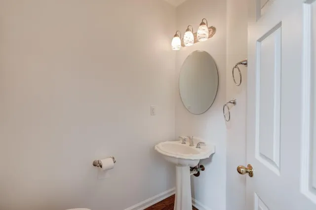 a view of entryway with wooden floor and stair