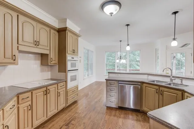 a view of entryway with wooden floor