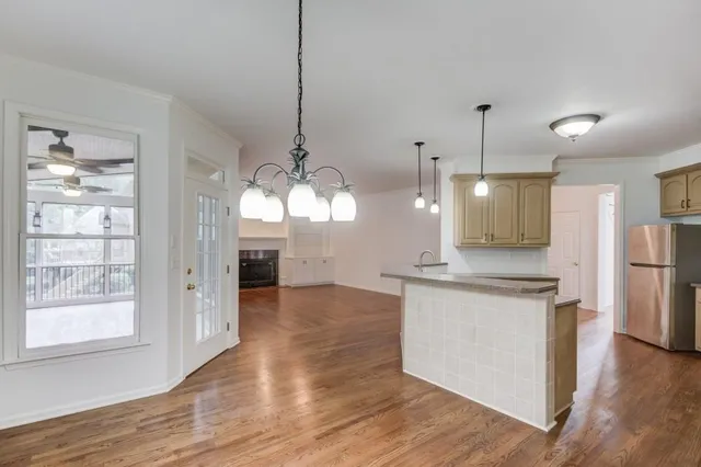 a house with trees in the background