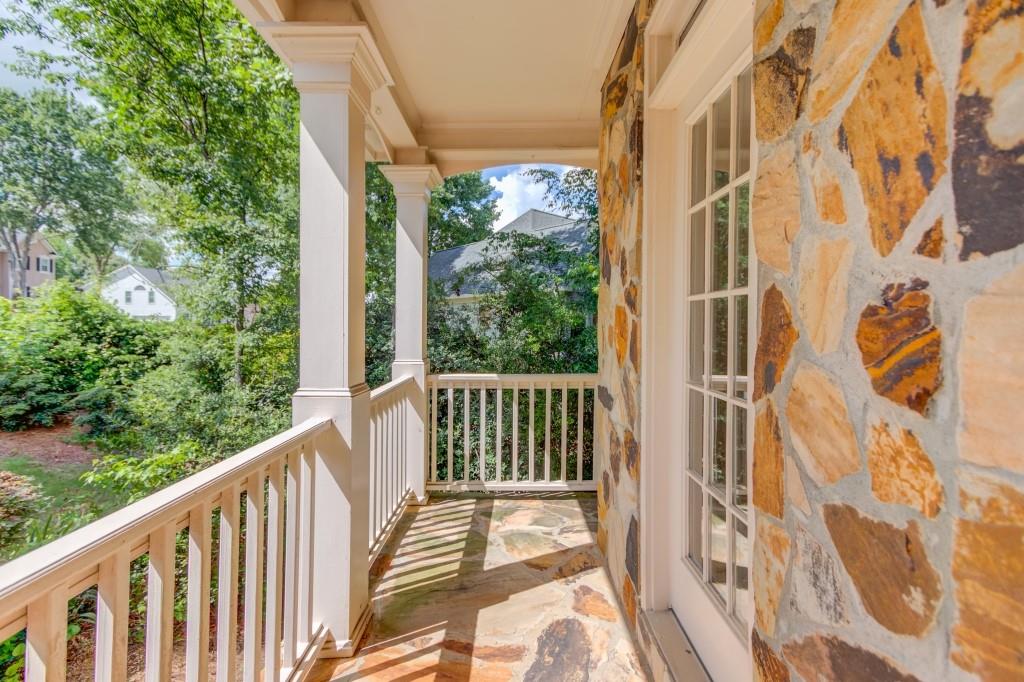 2405 Millwater Crossing Northeast Dacula, GA 30019 - Photo 63 of 63 a view of a balcony with wooden floor