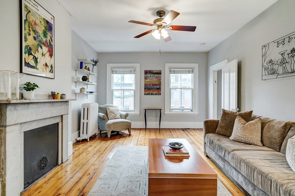 72 Rutland Street, Unit 3 Boston, MA 02118 - Photo 14 of 27 a living room with furniture and a fireplace