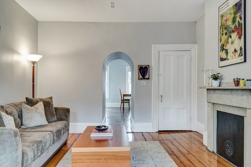 72 Rutland Street, Unit 3 Boston, MA 02118 - Photo 19 of 27 a living room with furniture and a fireplace