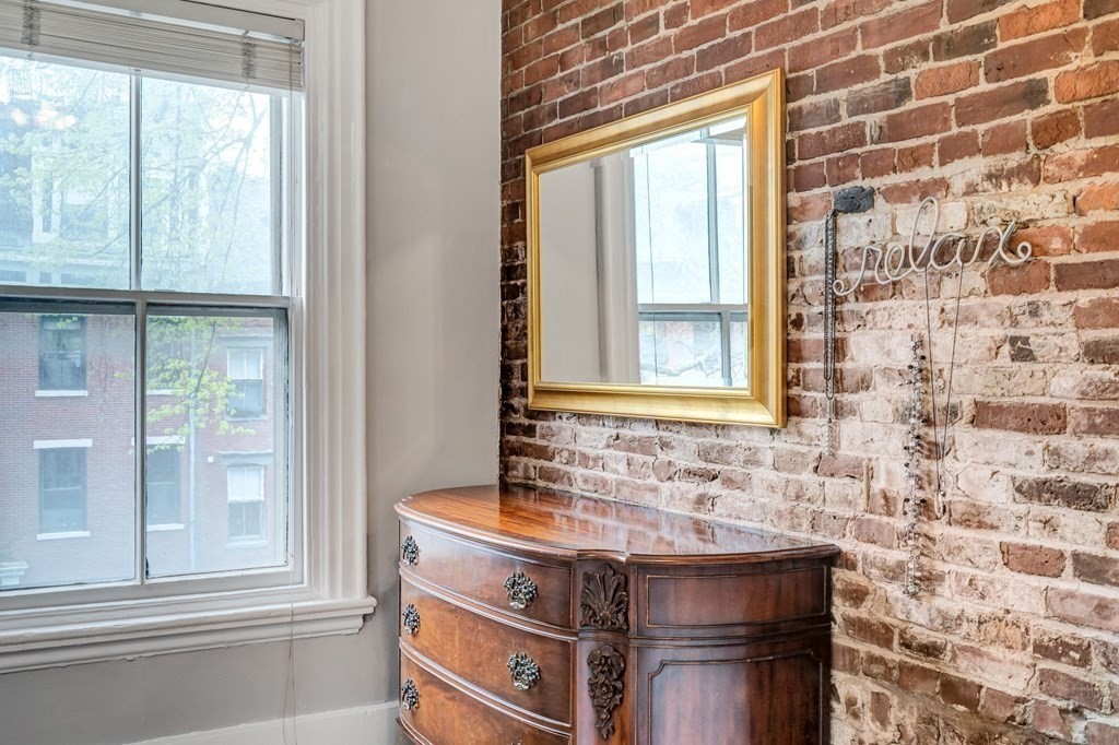 72 Rutland Street, Unit 3 Boston, MA 02118 - Photo 23 of 27 a bathroom with a sink and a mirror