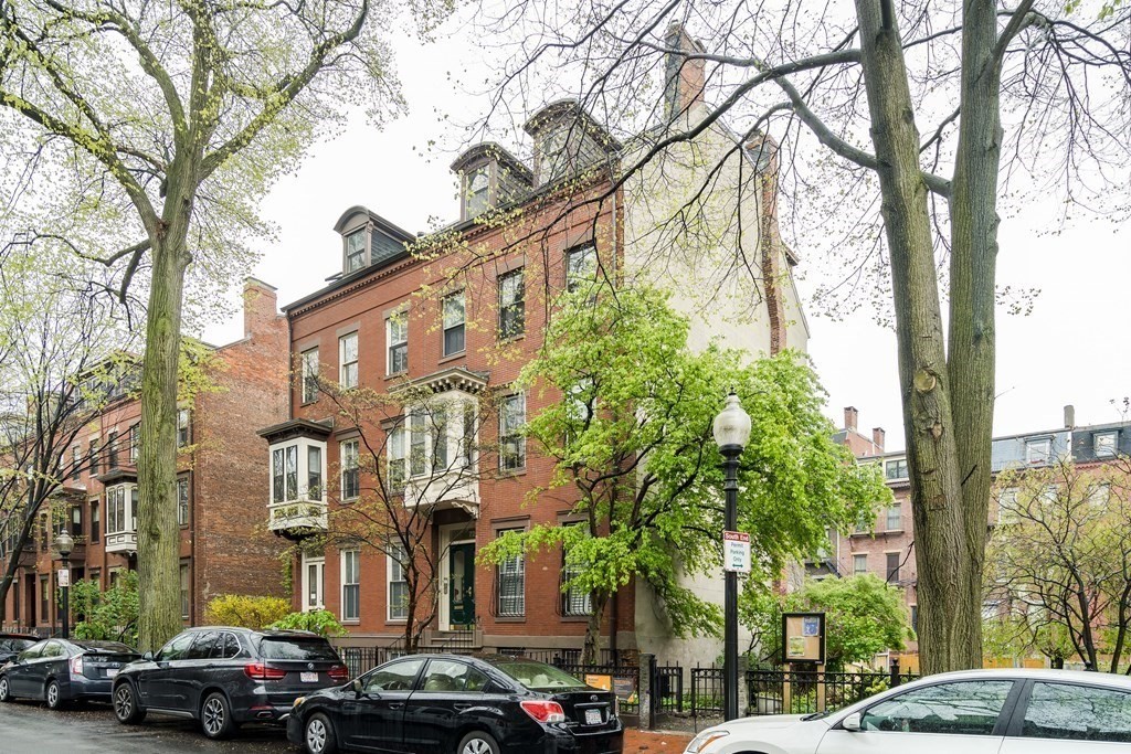 72 Rutland Street, Unit 3 Boston, MA 02118 - Photo 26 of 27 a city street lined with buildings and cars