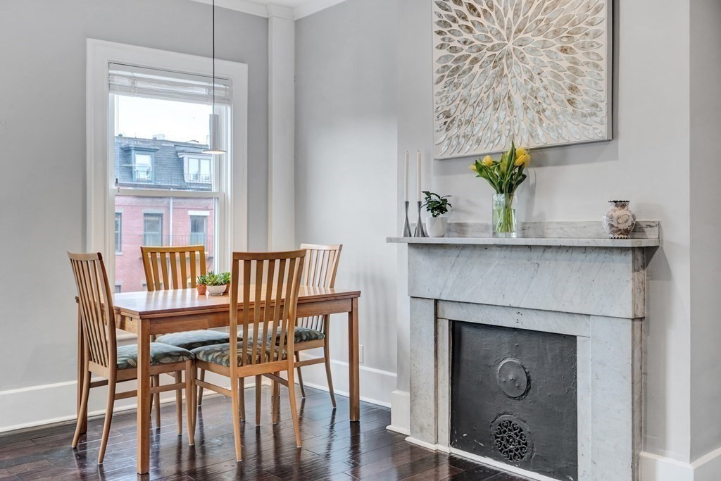 72 Rutland Street, Unit 3 Boston, MA 02118 - Photo 5 of 27 a dining room with furniture potted plants and wooden floor