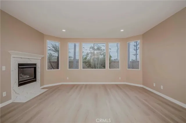 a bedroom with a bed and flat screen tv