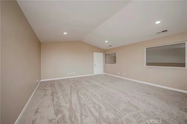 a view of a hallway with closet