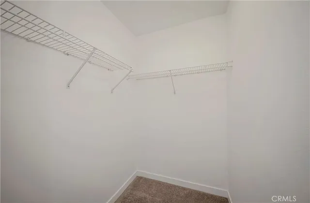 a view of a room with lots of wooden walls