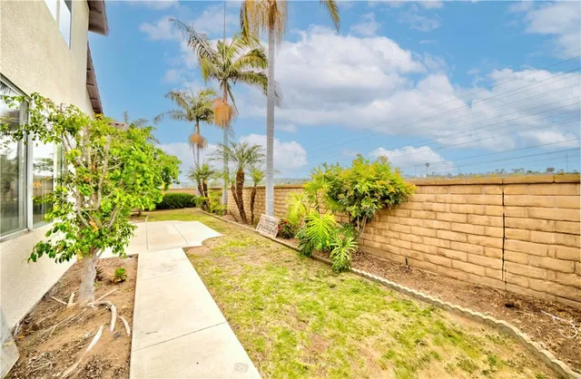 an aerial view of a house with a swimming pool