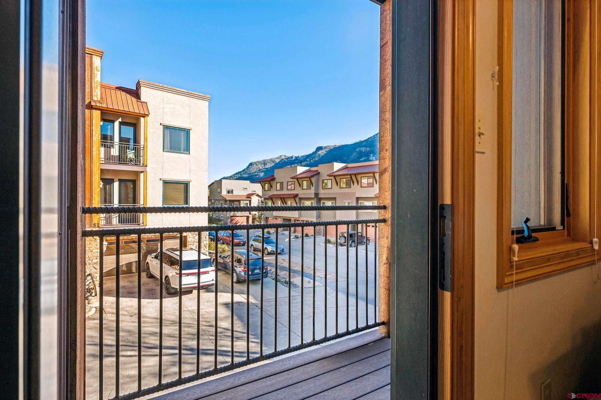 1422 Animas View Drive, Unit 55 Durango, CO 81301 - Photo 31 of 44 a view of a balcony with a floor to ceiling window