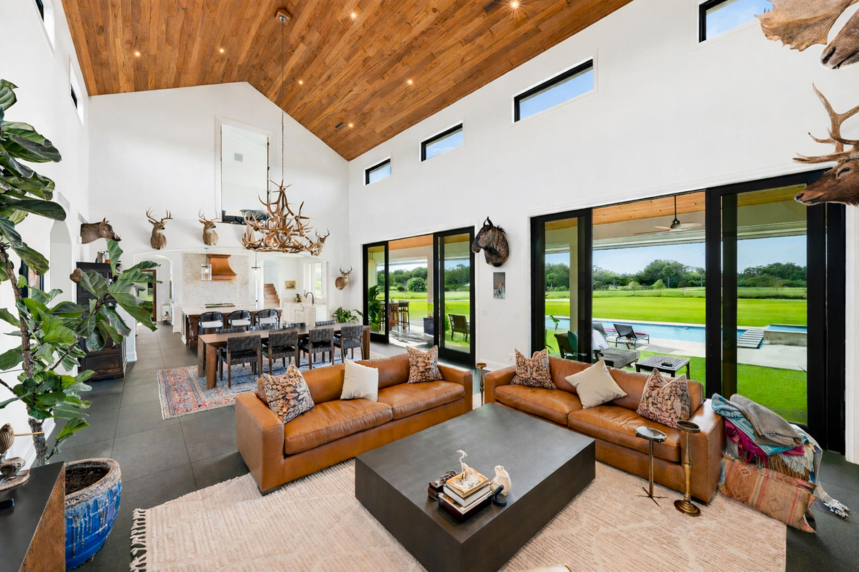26209 Southwest Jockeys Run Okeechobee, FL 34974 - Photo 23 of 57 Spacious living room with pool view