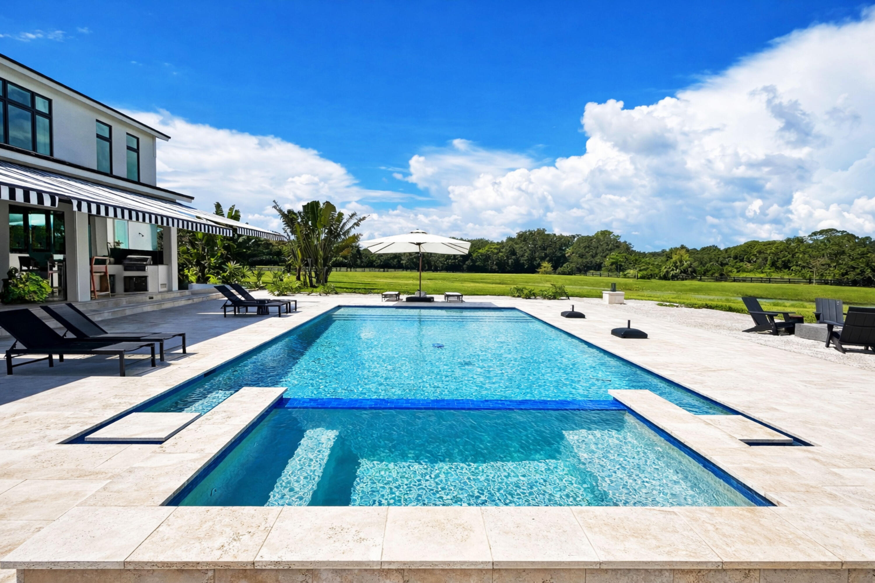 26209 Southwest Jockeys Run Okeechobee, FL 34974 - Photo 3 of 57 Modern poolside retreat with a view