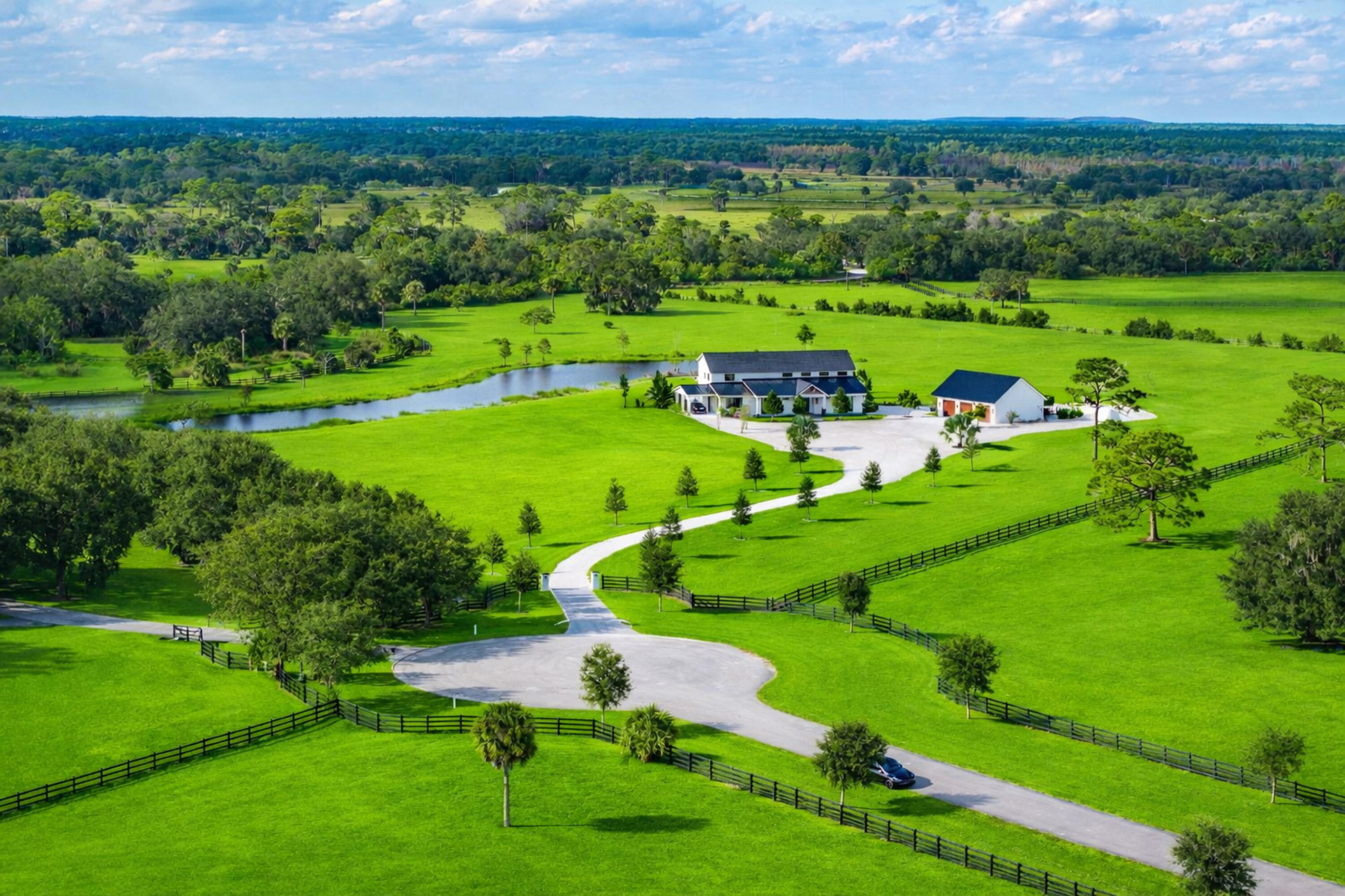 26209 Southwest Jockeys Run Okeechobee, FL 34974 - Photo 4 of 57 Peaceful English Manor with pond