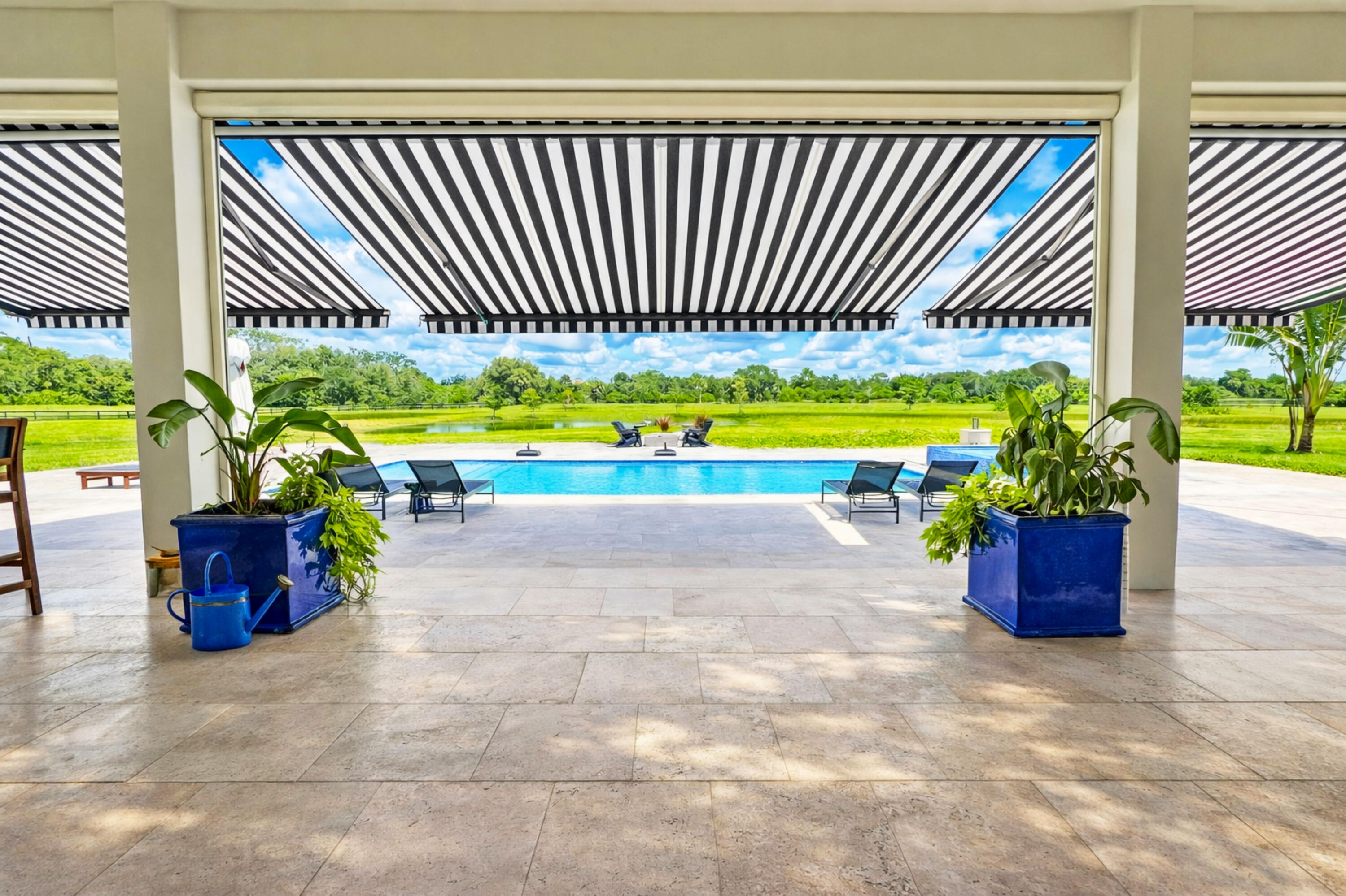 26209 Southwest Jockeys Run Okeechobee, FL 34974 - Photo 45 of 57 Patio oasis with pool view