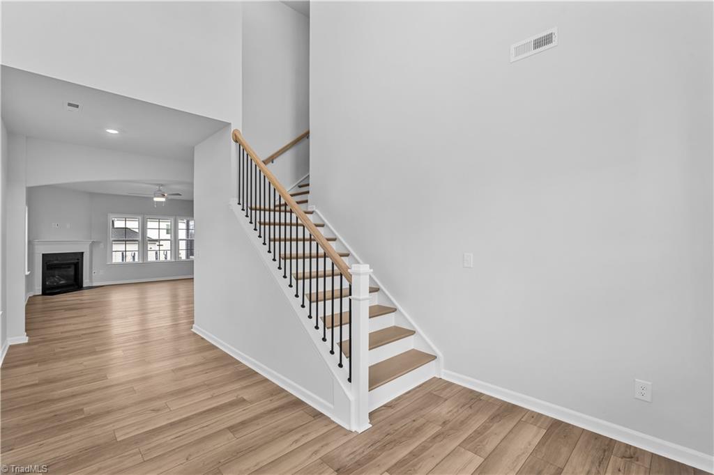 3000 Bayou Street Graham, NC 27253 - Photo 3 of 39 Beautiful Wood Stairs & a Blank Canvas to design an inviting entryway