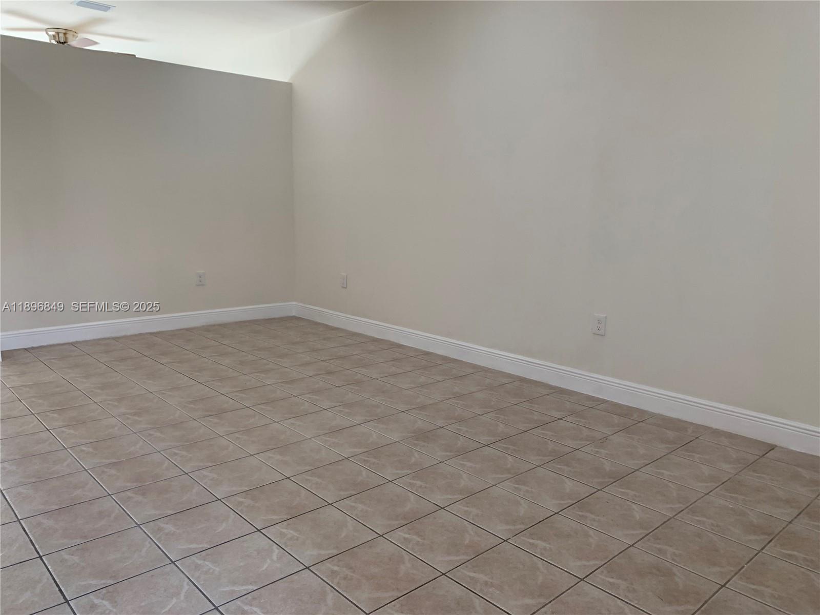 14179 Southwest 126th Place Miami, FL 33186 - Photo 3 of 26 a view of an empty room