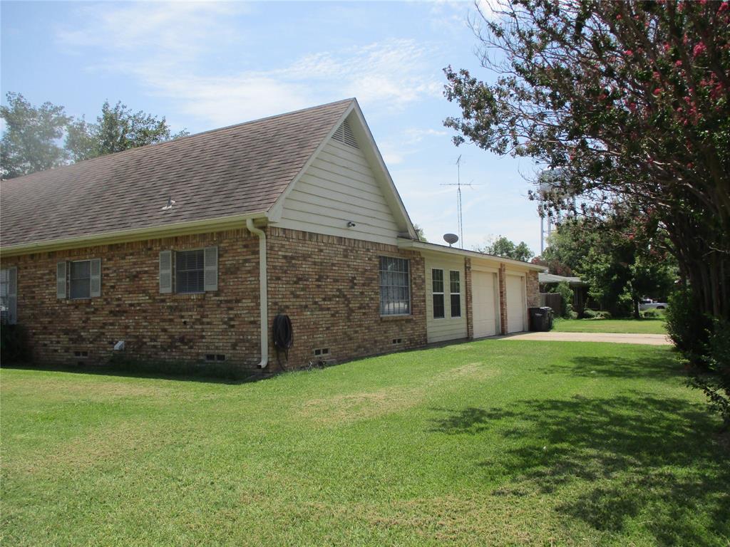 235 Industrial Point Point, TX 75472 - Photo 3 of 34 a view of a house with a yard