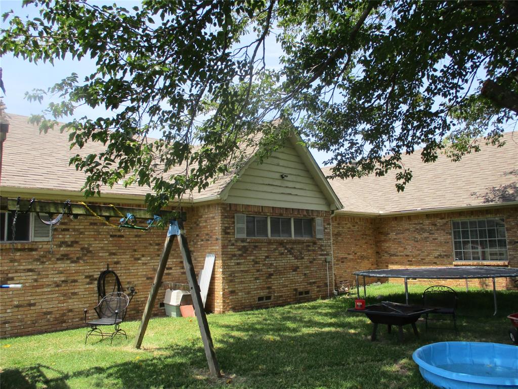 235 Industrial Point Point, TX 75472 - Photo 8 of 34 a front view of a house with a yard