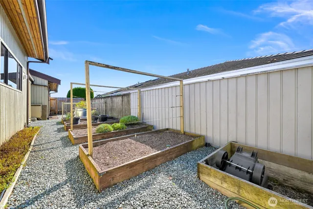 an aerial view of a houses with outdoor space