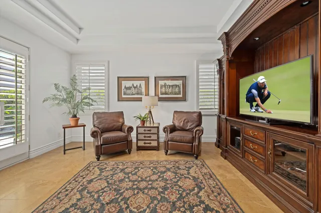 a en suite bathroom with a granite countertop sink mirror and shower