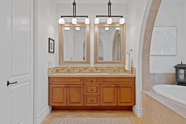 a view of a chairs and table in patio