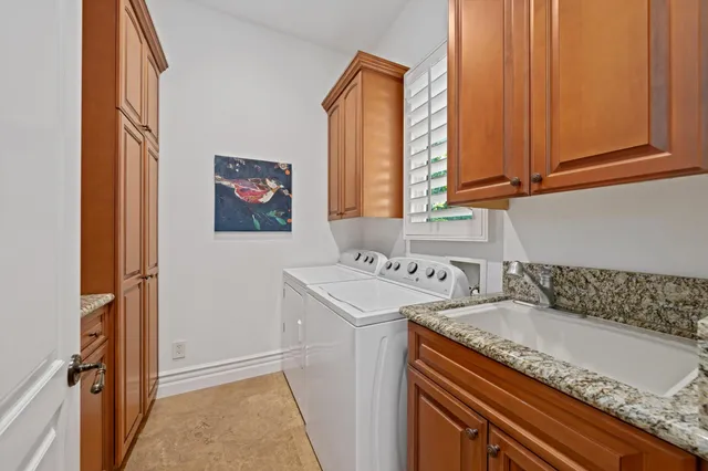 a view of a house with swimming pool and sitting area
