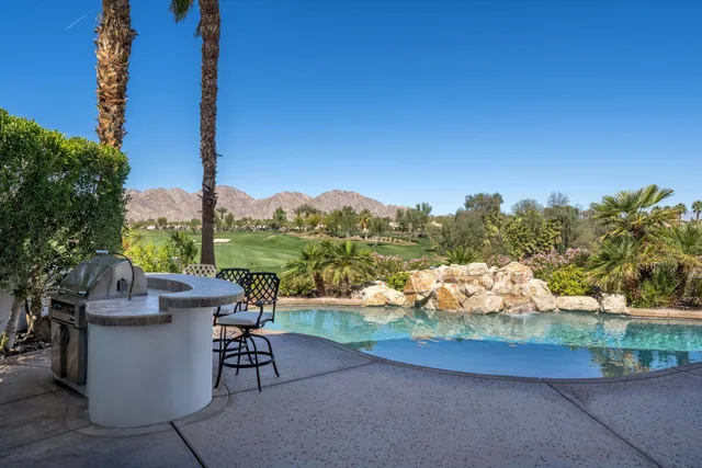 a view of a city with a mountain in the background