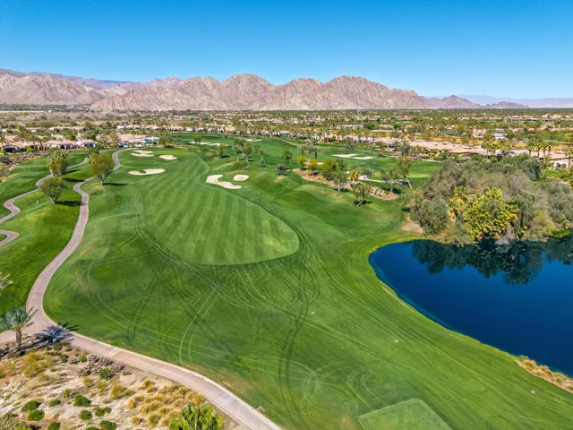 a view of living room with furniture and a window