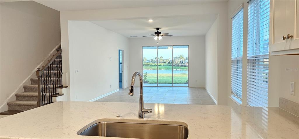 4233 Pond Brk Court Lakewood Ranch, FL 34211 - Photo 15 of 49 a view of entryway and hall with a bath tub