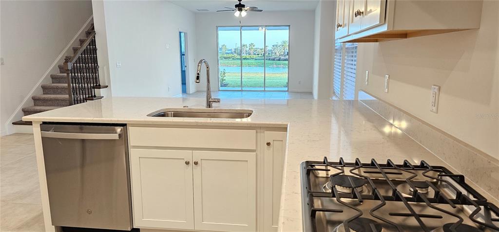 4233 Pond Brk Court Lakewood Ranch, FL 34211 - Photo 16 of 49 a kitchen with a sink and a window