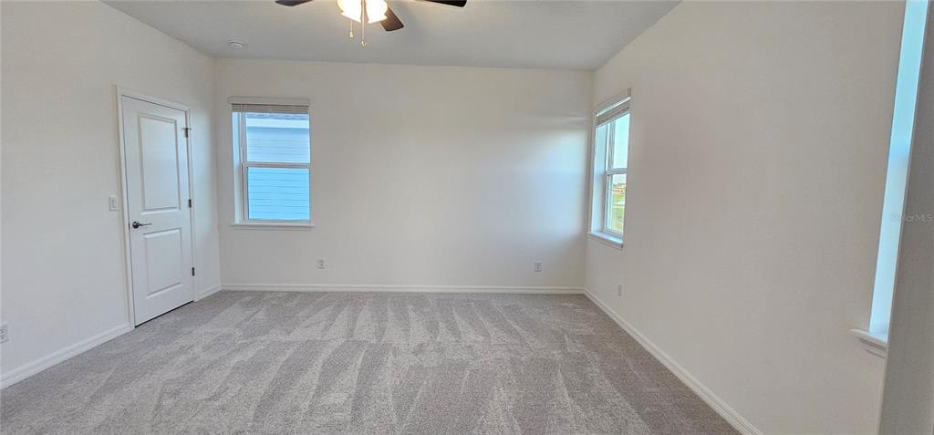4233 Pond Brk Court Lakewood Ranch, FL 34211 - Photo 26 of 49 an empty room with a window