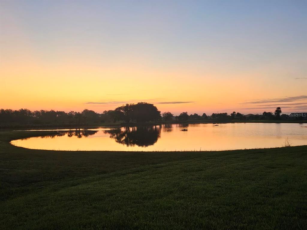 4233 Pond Brk Court Lakewood Ranch, FL 34211 - Photo 3 of 49 a view of lake with mountain
