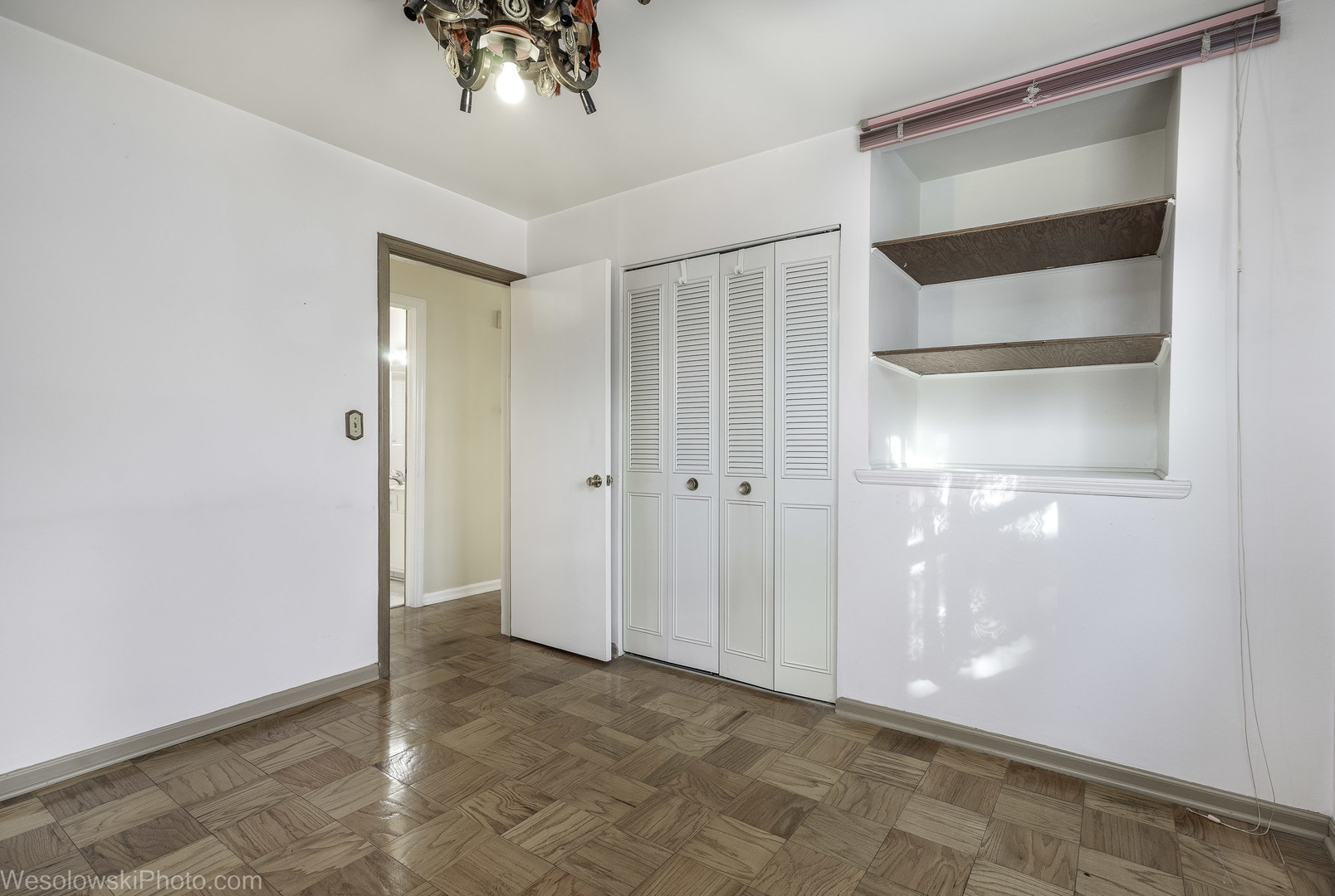 1822 West Catalpa Lane Mount Prospect, IL 60056 - Photo 13 of 24 a view of entryway with a chandelier fan
