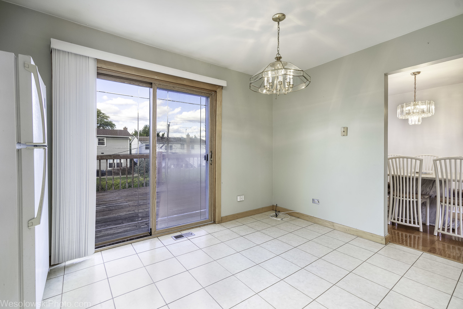 1822 West Catalpa Lane Mount Prospect, IL 60056 - Photo 6 of 24 a view of an empty room with a window