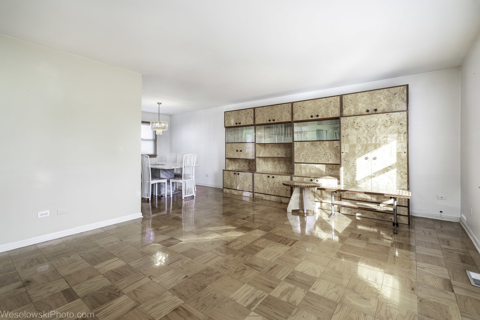 1822 West Catalpa Lane Mount Prospect, IL 60056 - Photo 7 of 24 an empty room with floor to ceiling window and dining room
