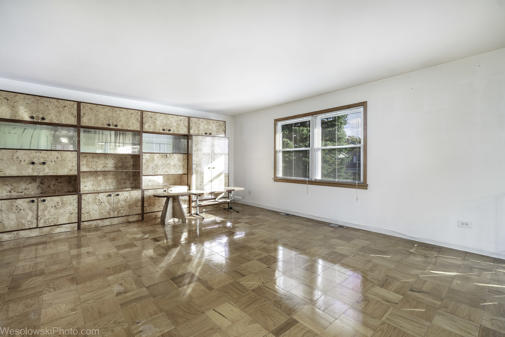 1822 West Catalpa Lane Mount Prospect, IL 60056 - Photo 10 of 24 an empty room with floor to ceiling window and floor to ceiling window