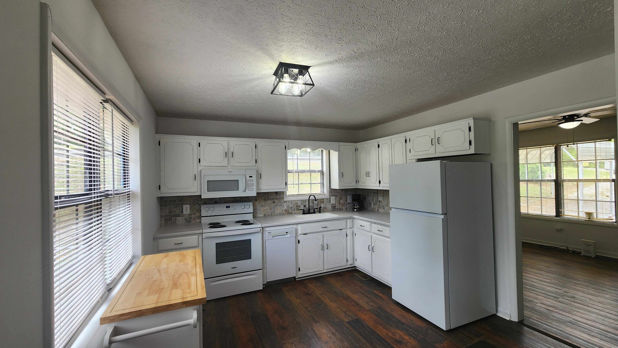 1825 Free Hill Road Celina, TN 38551 - Photo 15 of 49 a kitchen with stainless steel appliances a refrigerator sink and stove