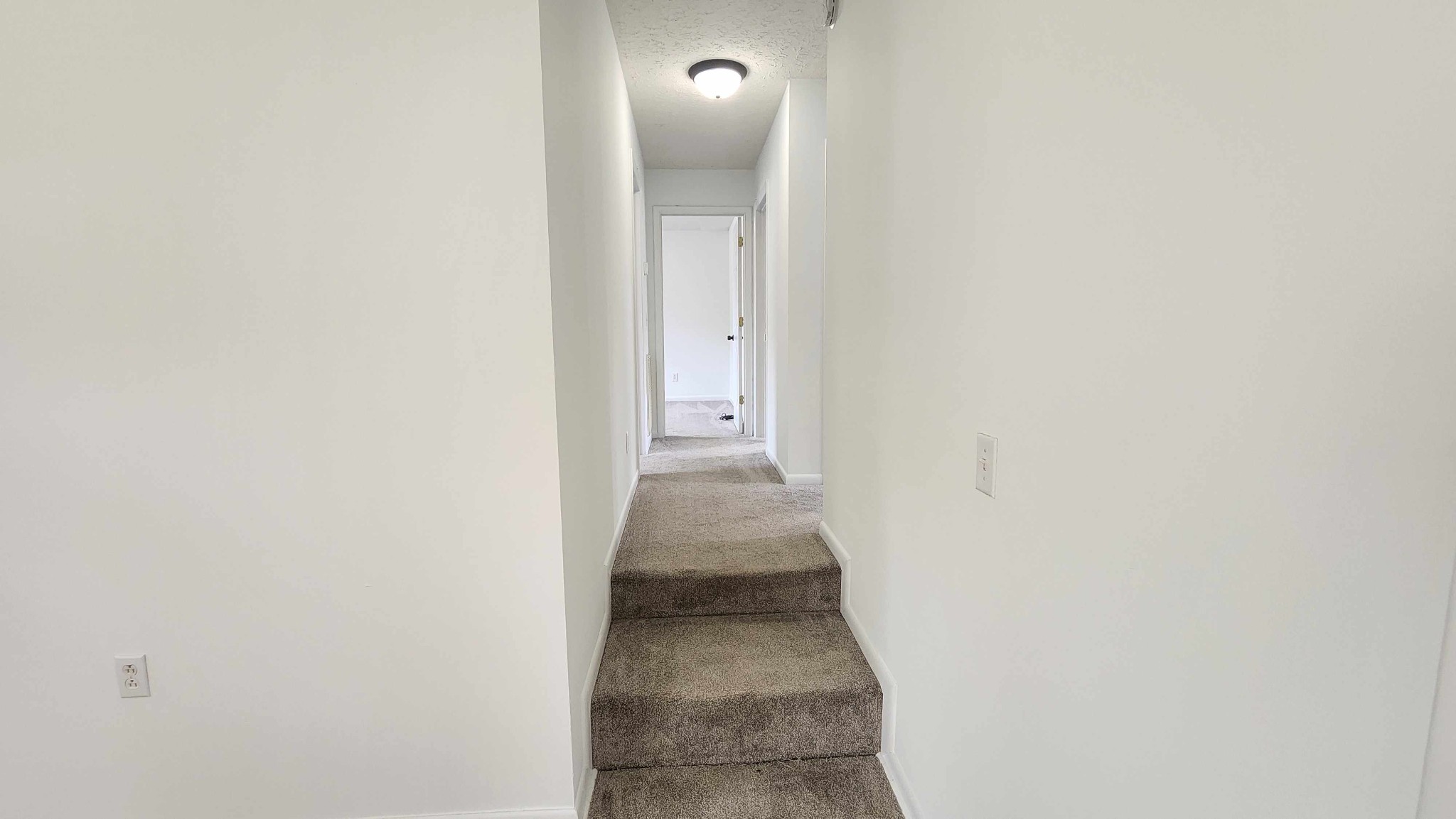 1825 Free Hill Road Celina, TN 38551 - Photo 20 of 49 a view of a hallway with wooden floor