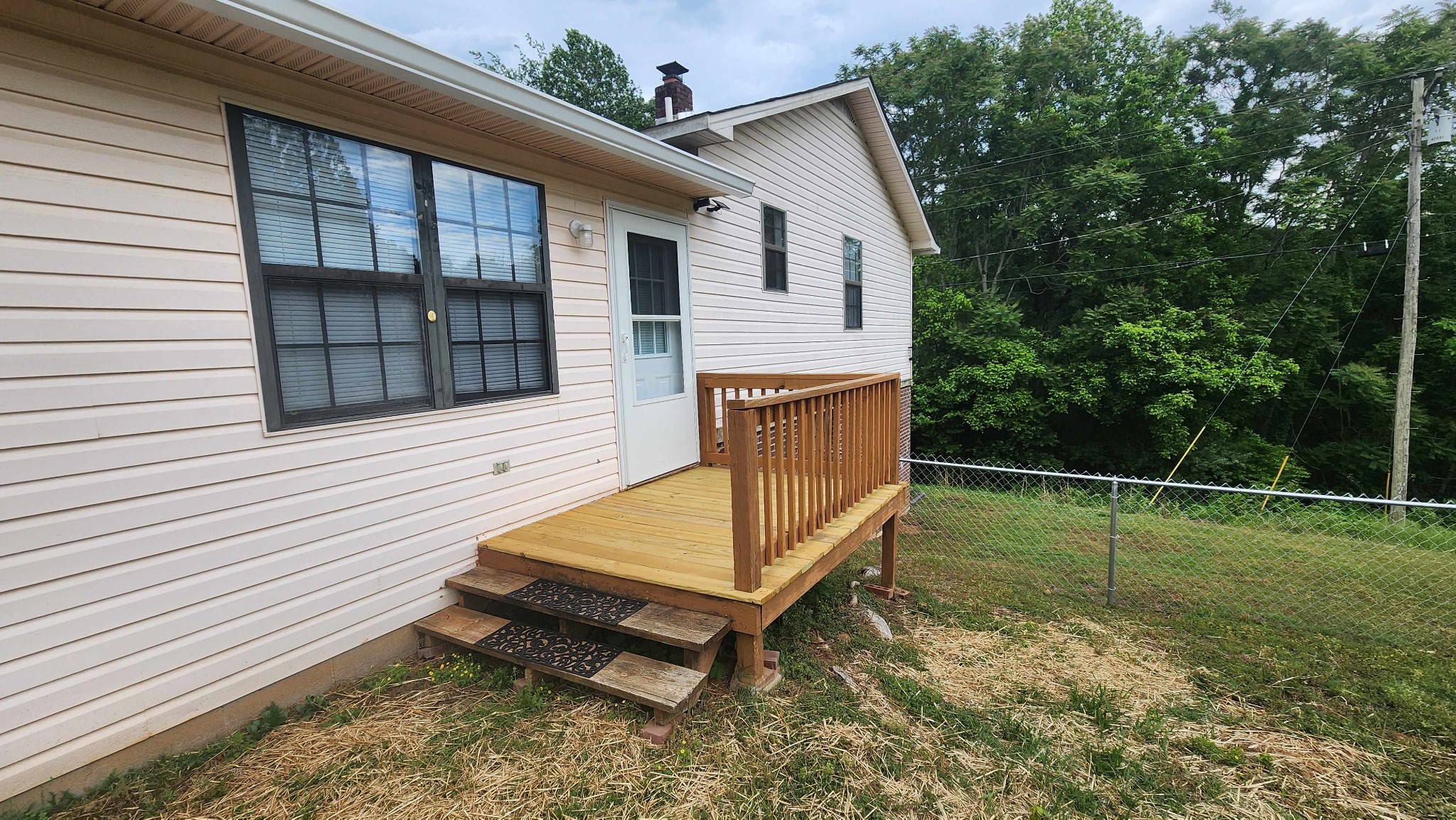 1825 Free Hill Road Celina, TN 38551 - Photo 2 of 49 a backyard of a house with seating space