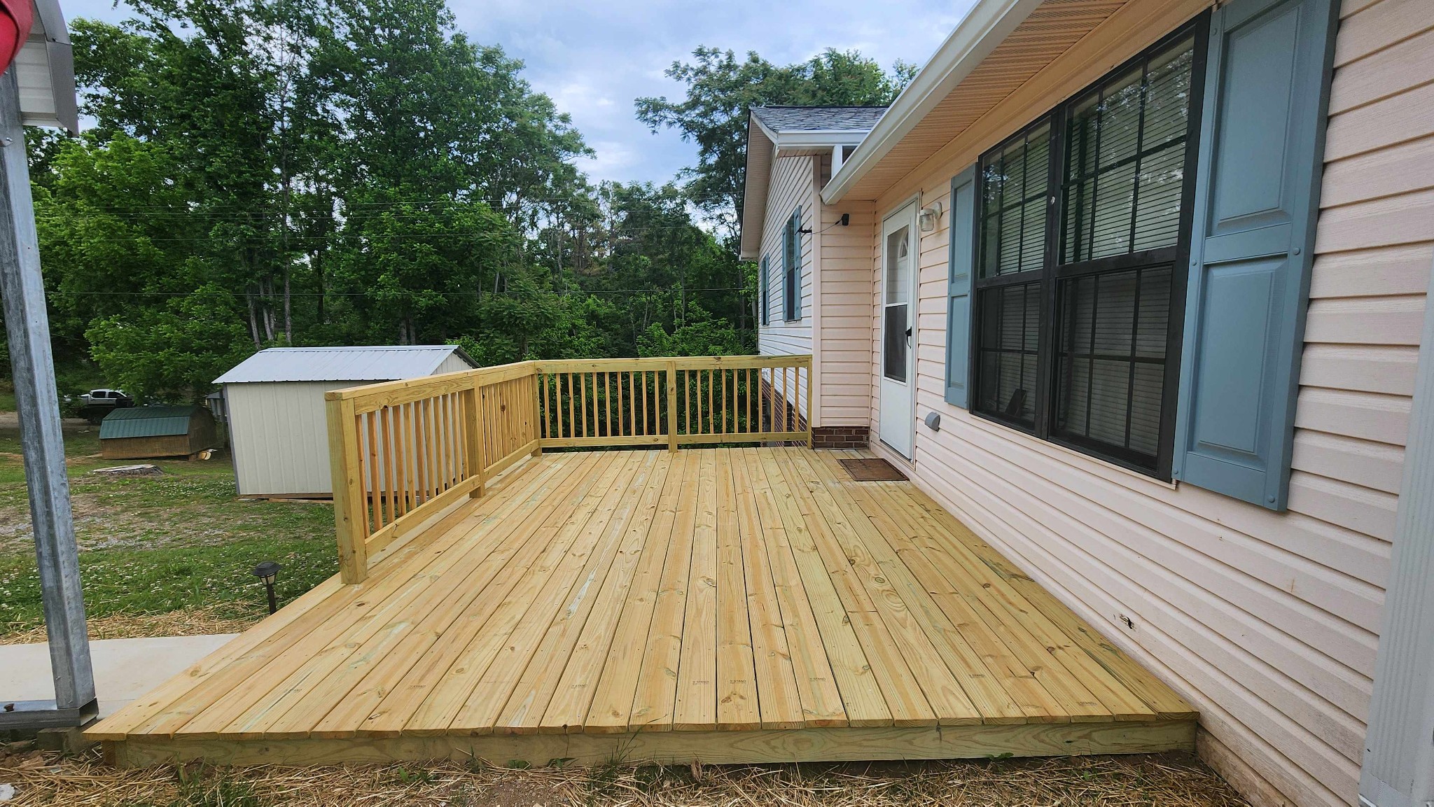 1825 Free Hill Road Celina, TN 38551 - Photo 31 of 49 a view of backyard with deck and garden