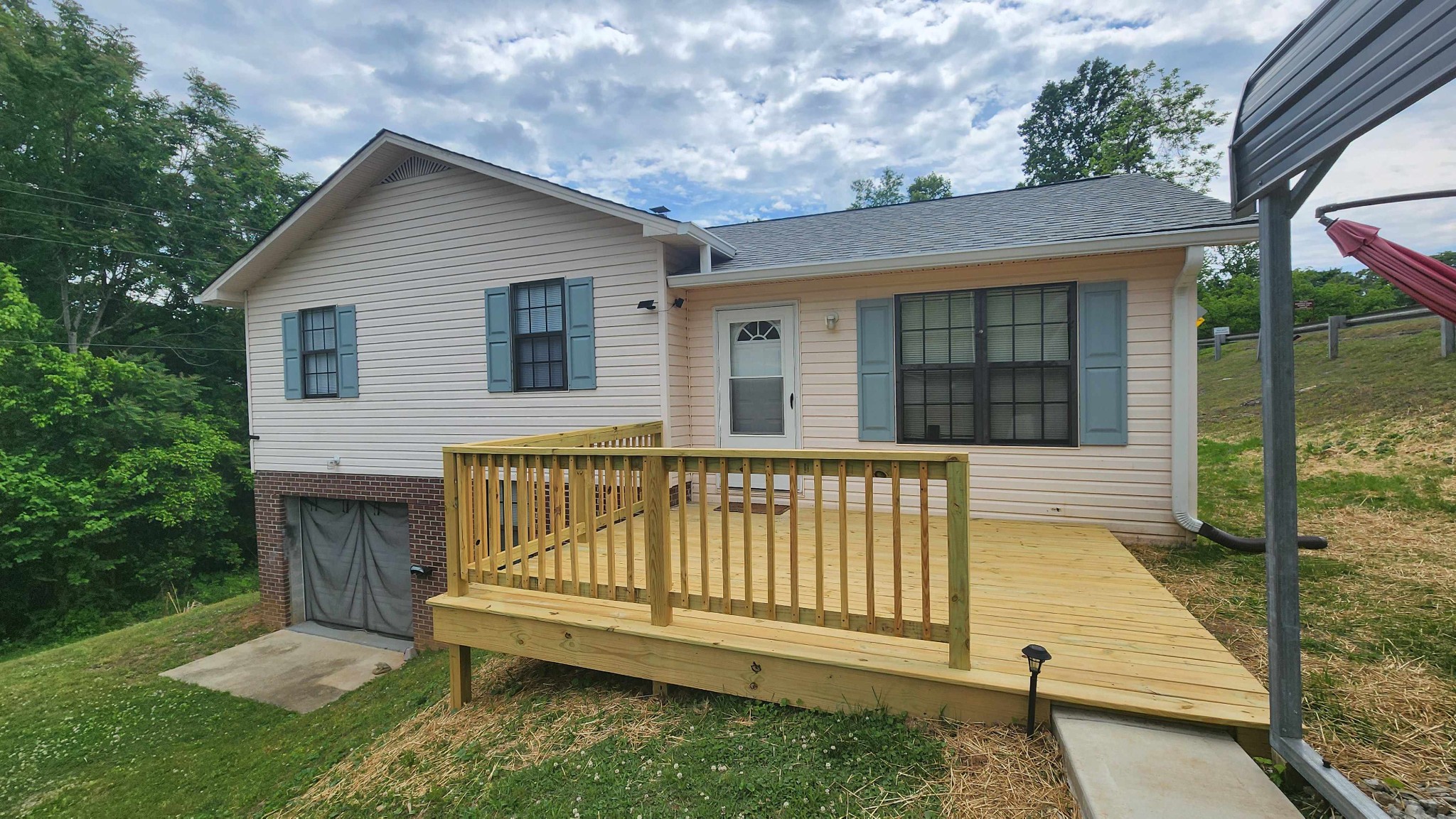 1825 Free Hill Road Celina, TN 38551 - Photo 32 of 49 a view of a house with a yard