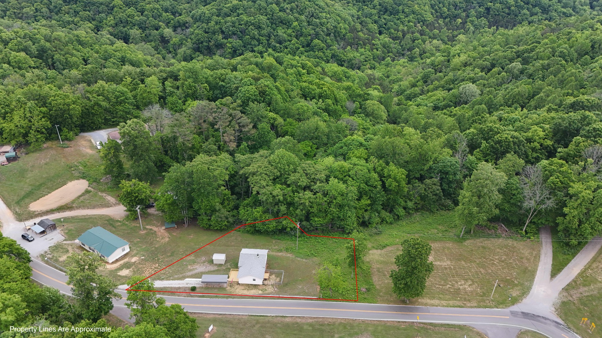1825 Free Hill Road Celina, TN 38551 - Photo 43 of 49 an aerial view of a house with yard