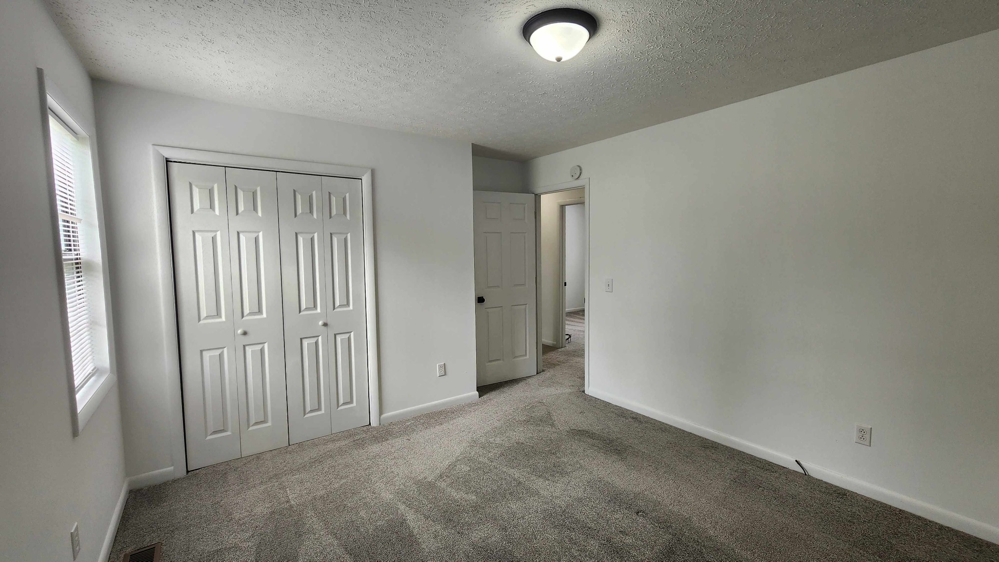 1825 Free Hill Road Celina, TN 38551 - Photo 10 of 49 an empty room with closet area