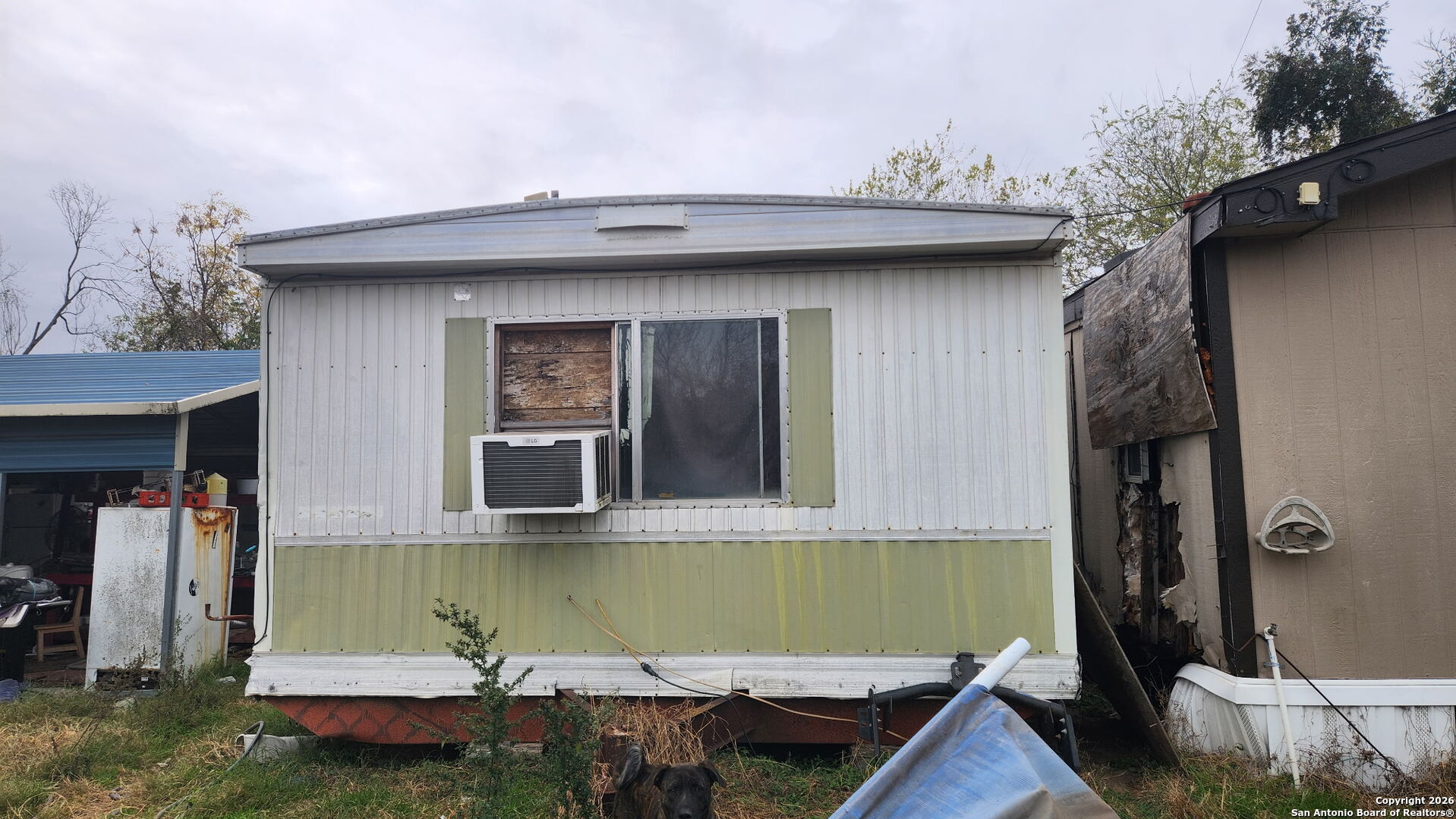 a view of a house with a tub and wooden floor