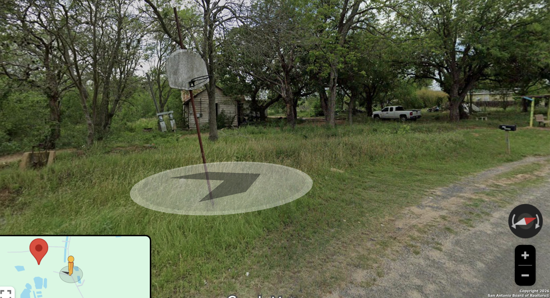 12815 Kenagy Road Atascosa, TX 78002 - Photo 8 of 10 a view of a backyard with a garden and entertaining space