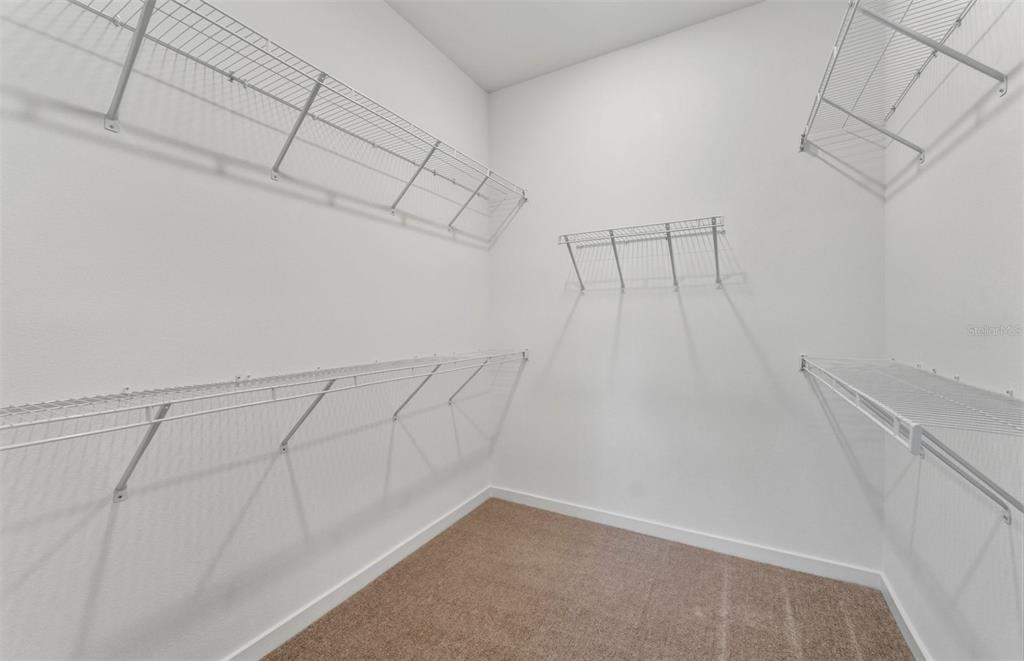 13764 Rocky Pne Place Spring Hill, FL 34610 - Photo 11 of 29 a view of a room with racks on the wall