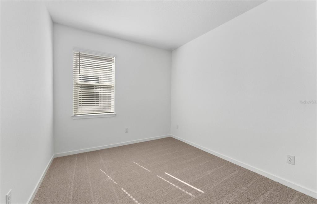 13764 Rocky Pne Place Spring Hill, FL 34610 - Photo 13 of 29 an empty room with a window