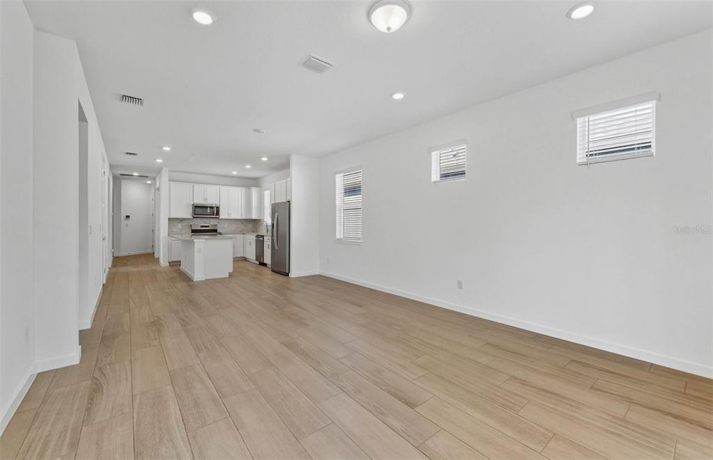 13764 Rocky Pne Place Spring Hill, FL 34610 - Photo 8 of 29 a view of kitchen with wooden floor